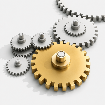 Gold and silver interlocking gears symbolizing business systems, processes, and scalable growth.